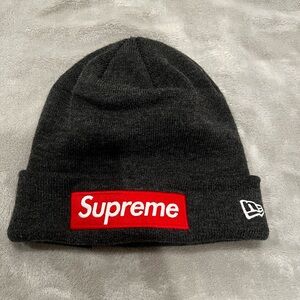 New Era Dark Gray Beanie with Red Logo supreme